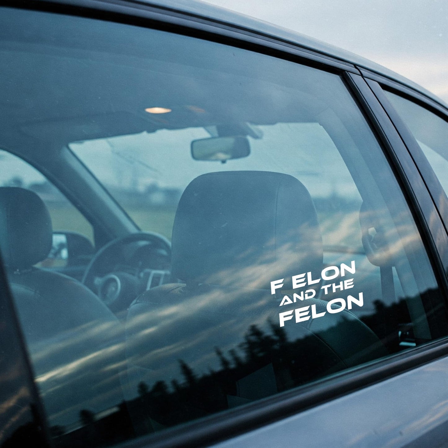 F Elon and The FELON Vinyl Decal | White Waterproof Car Sticker | Anti Elon Tesla Driver Bumper Decal | 7 x 3.65 Inch Weatherproof Vinyl Sticker
